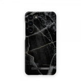 Ideal of Sweden Samsung Galaxy S23 Deksel Fashion Case Black Thunder Marble